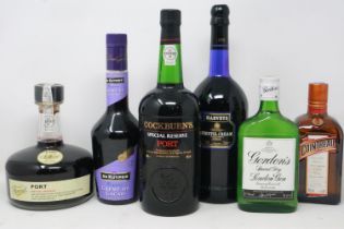 Six mixed bottles; Port (2), Sherry, Gin, Cointreau and Creme De Cacao. Not available for in-house