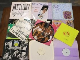 Twelve 10 inch & 12 inch singles including picture discs. UK P&P Group 2 (£20+VAT for the first