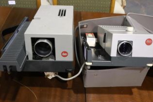 Leitz Pradovit colour projector and another. Not available for in-house P&P