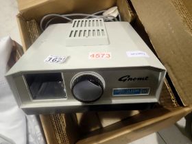 Gnome super classic automatic projector. All electrical items in this lot have been PAT tested for