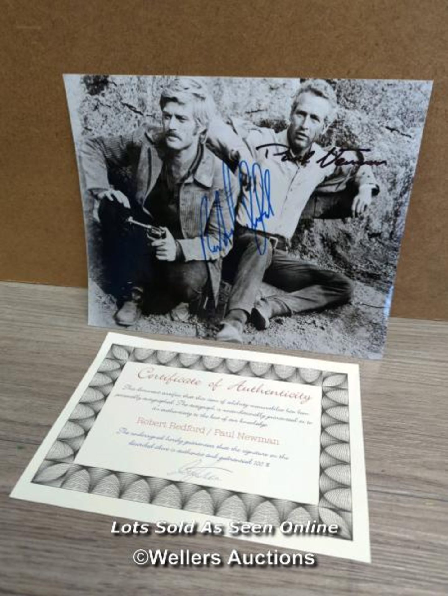 ROBERT REDFORD AND PAUL NEWMAN - PHOTO FROM BUTCH CASSIDY BEARING BOTH SIGNATURES WITH COAL
