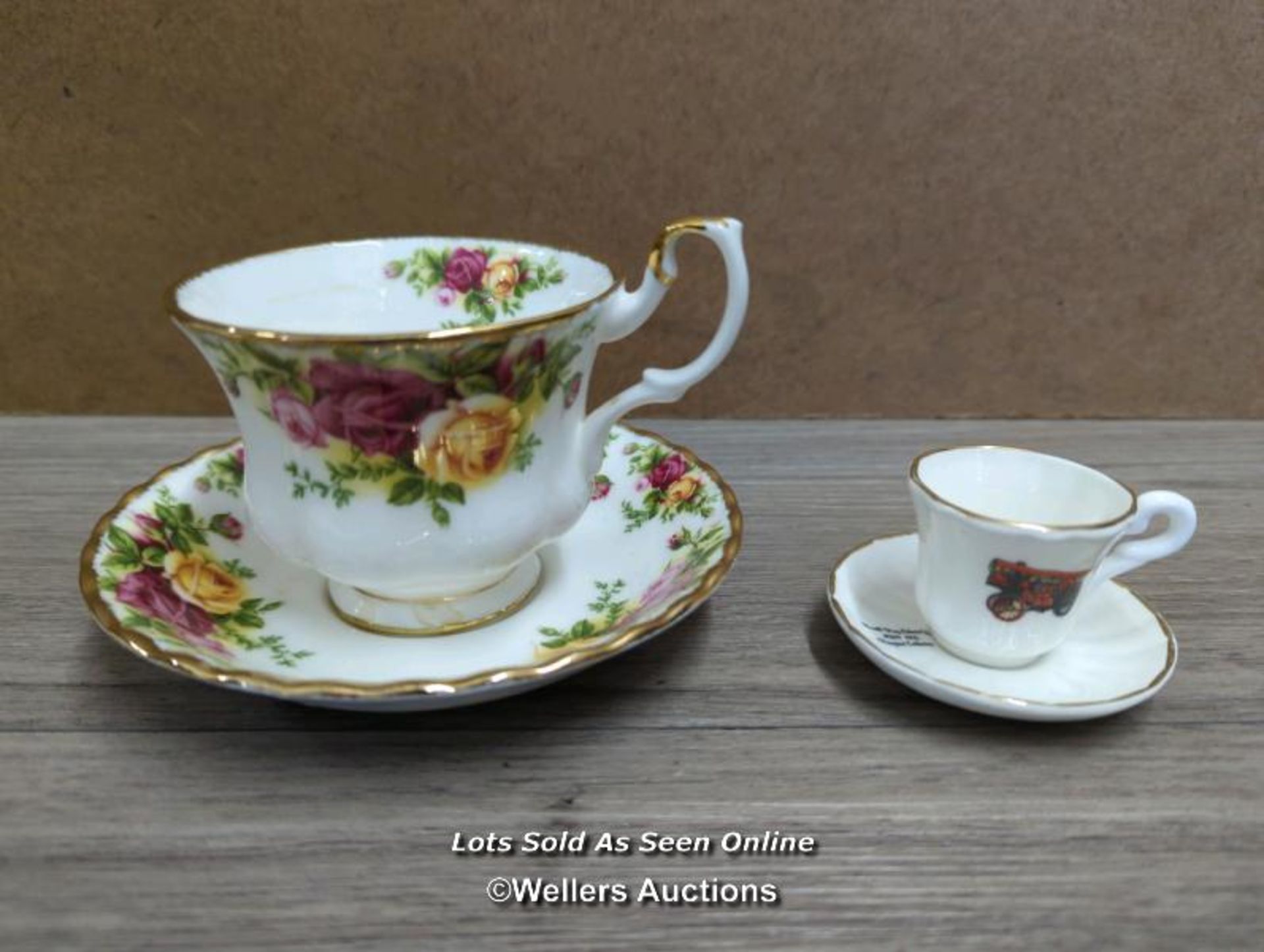 ROYAL ALBERT BONE CHINA CUP AND A MINIATURE CUP