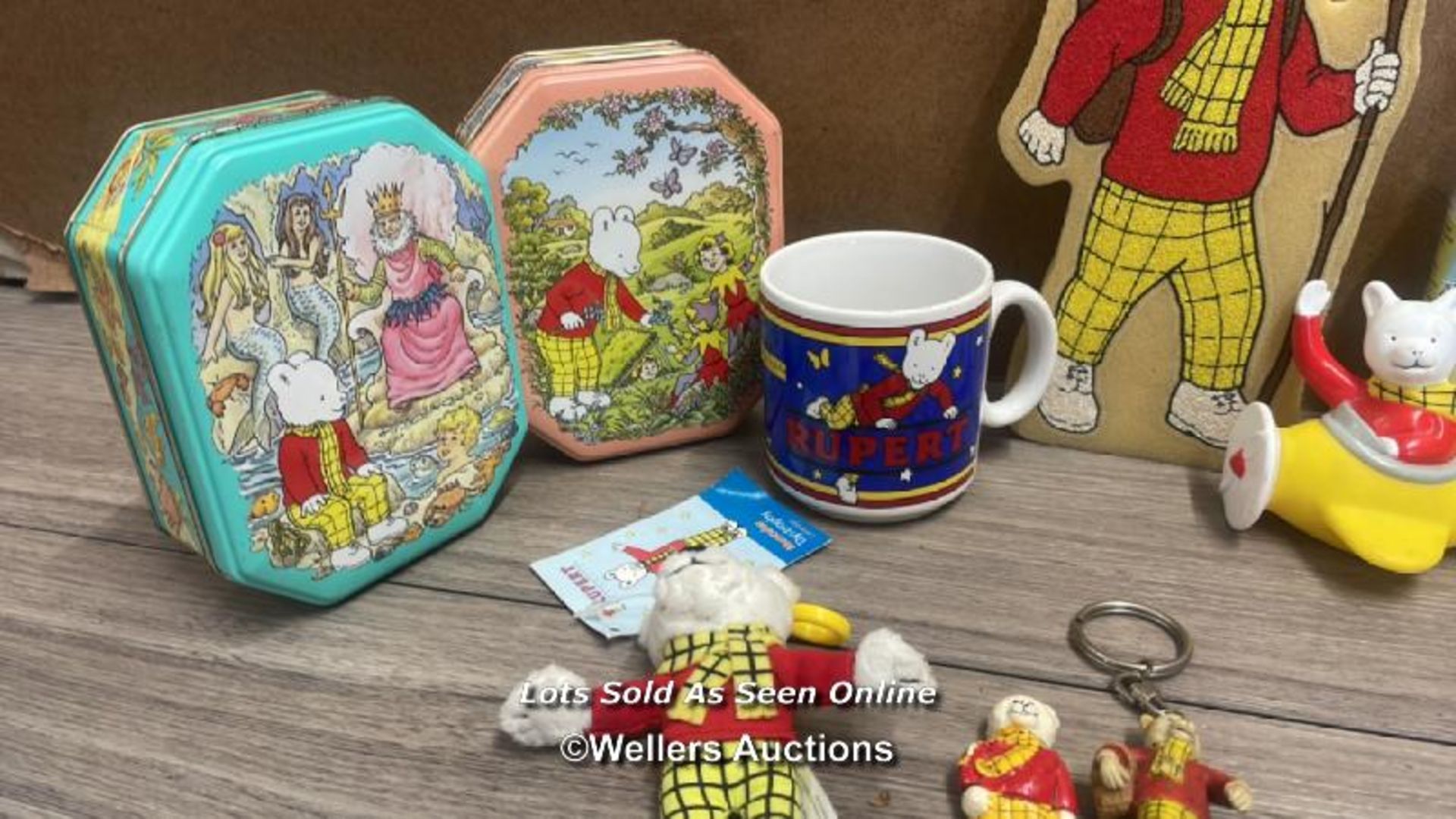 RUPERT BEAR MEMORABILIA INCLUDING MUG, TINS, SPONGE, CANS, STAMPS AND KEYRINGS - Image 5 of 7