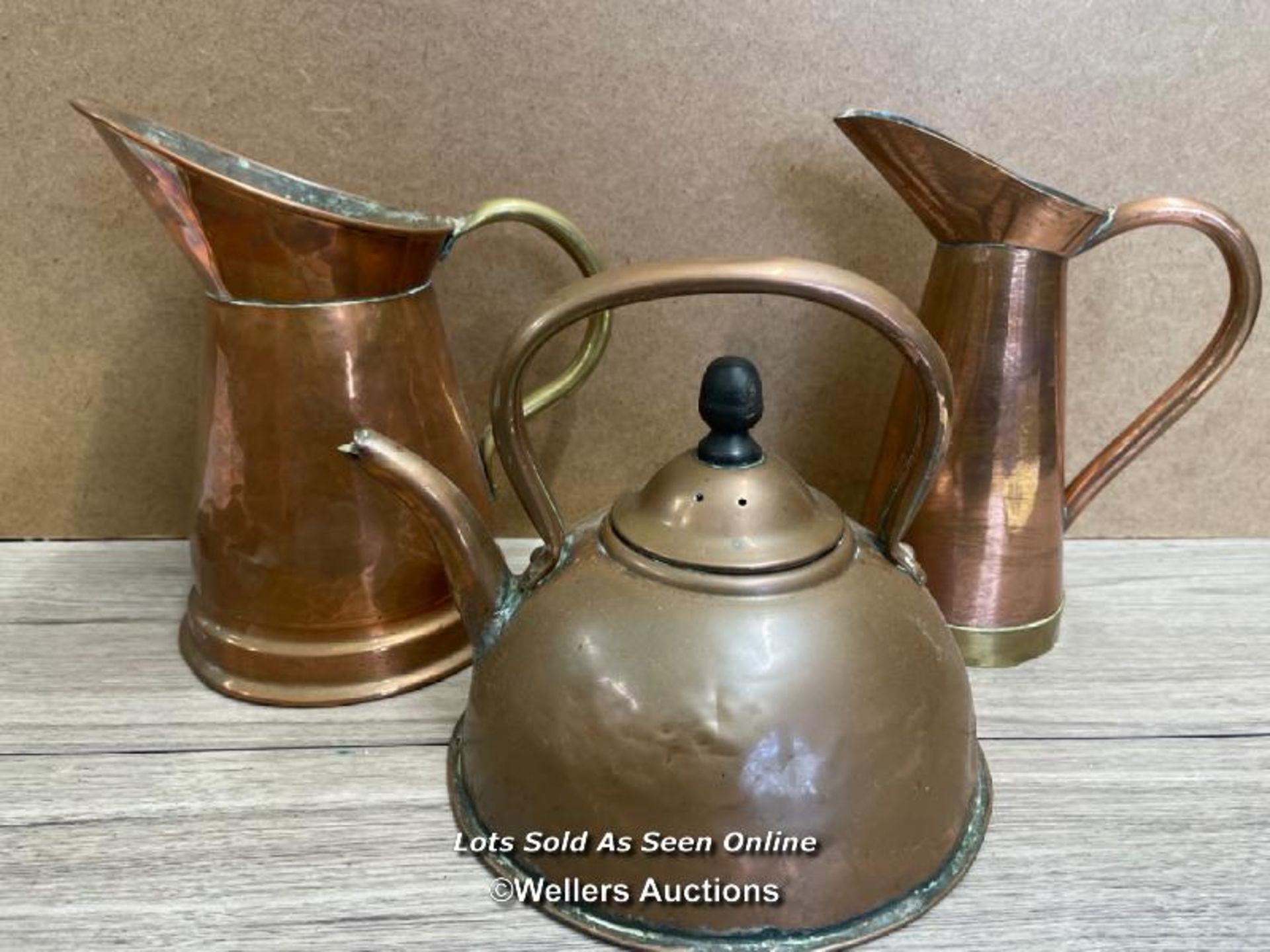 TWO COPPER WATER JUGS AND KETTLE
