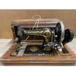 A VINTAGE FRISTER & ROSSMANN SEWING MACHINE WITH LOCKABLE CASE