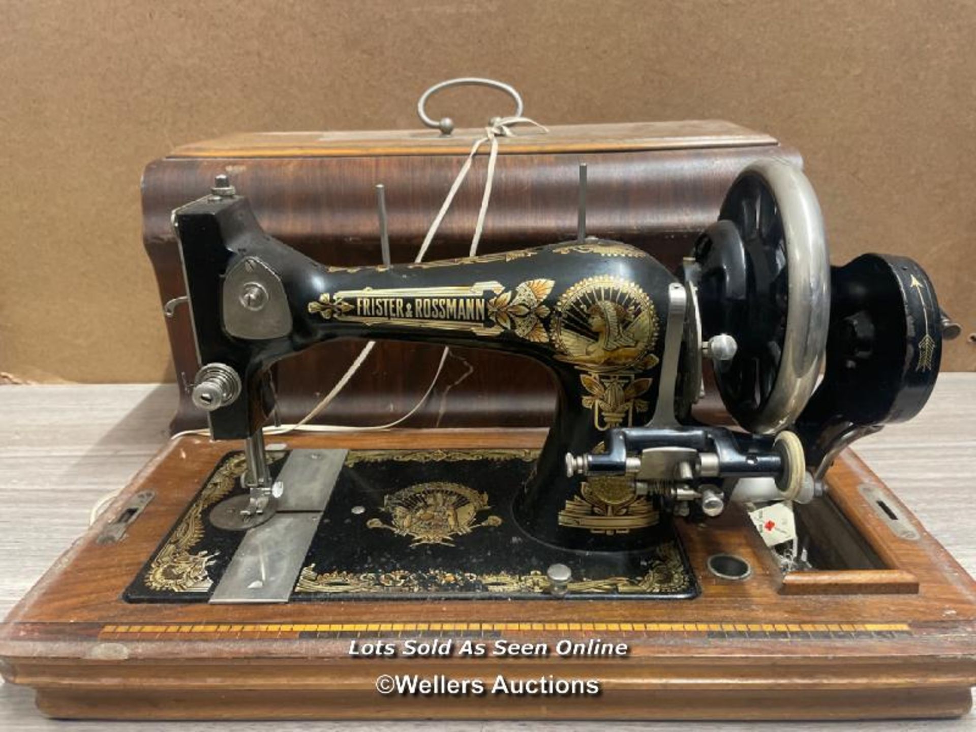 A VINTAGE FRISTER & ROSSMANN SEWING MACHINE WITH LOCKABLE CASE