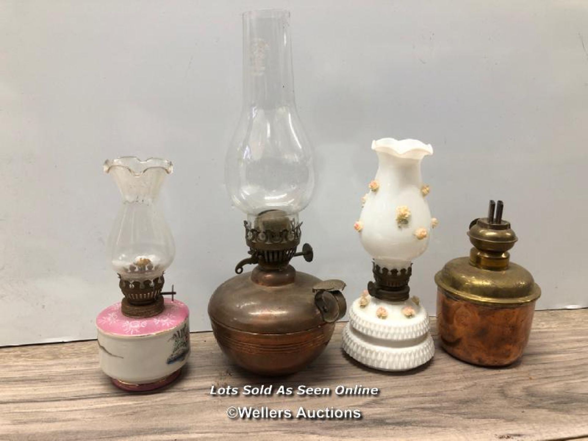 *FOUR SMALL OIL LAMPS INCLUDING A CERAMIC EXAMPLE