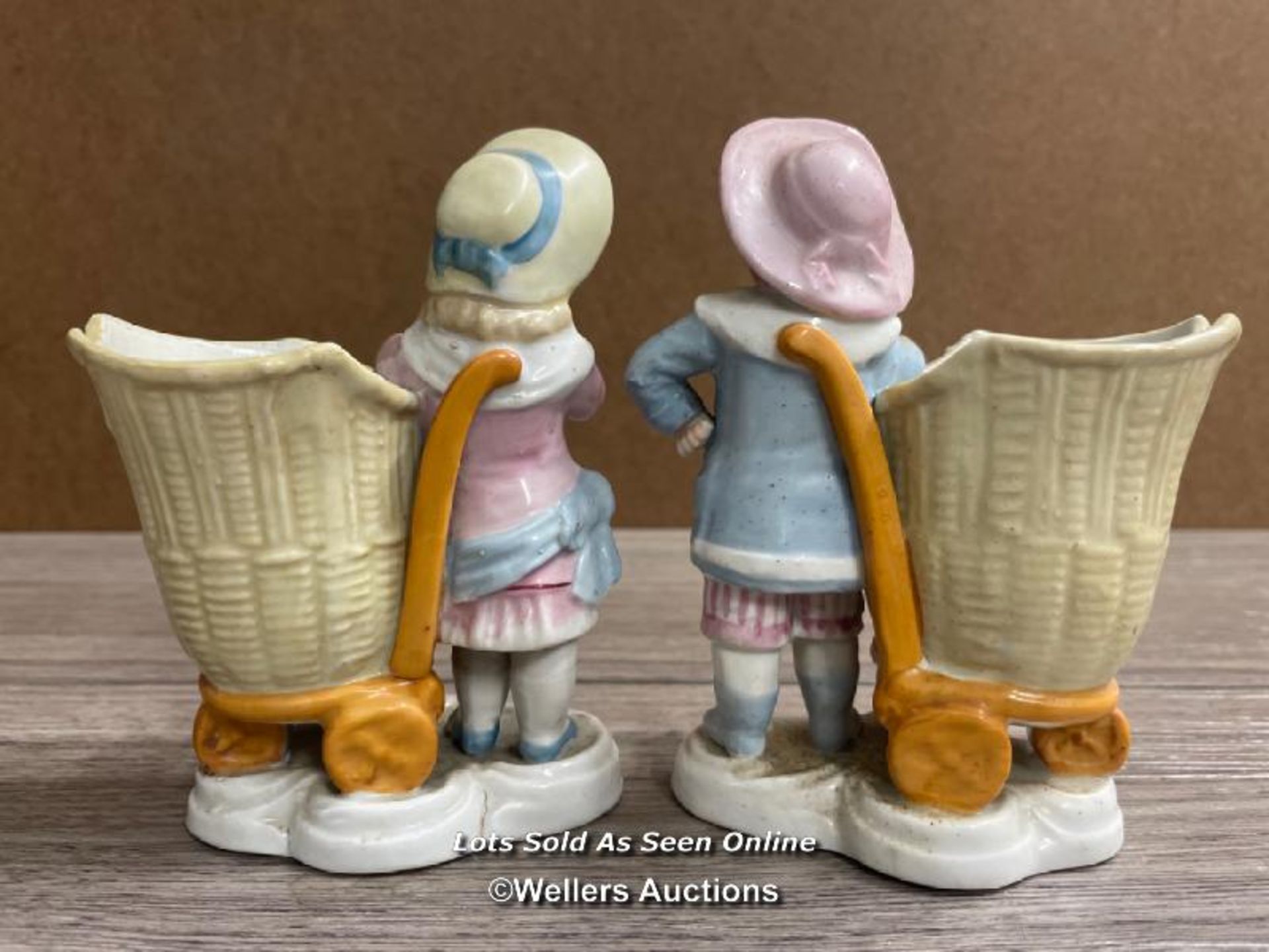A PAIR OF VICTORIAN SPILL VASES MODELLED AS CHILDREN WITH BASKETS - Image 2 of 3