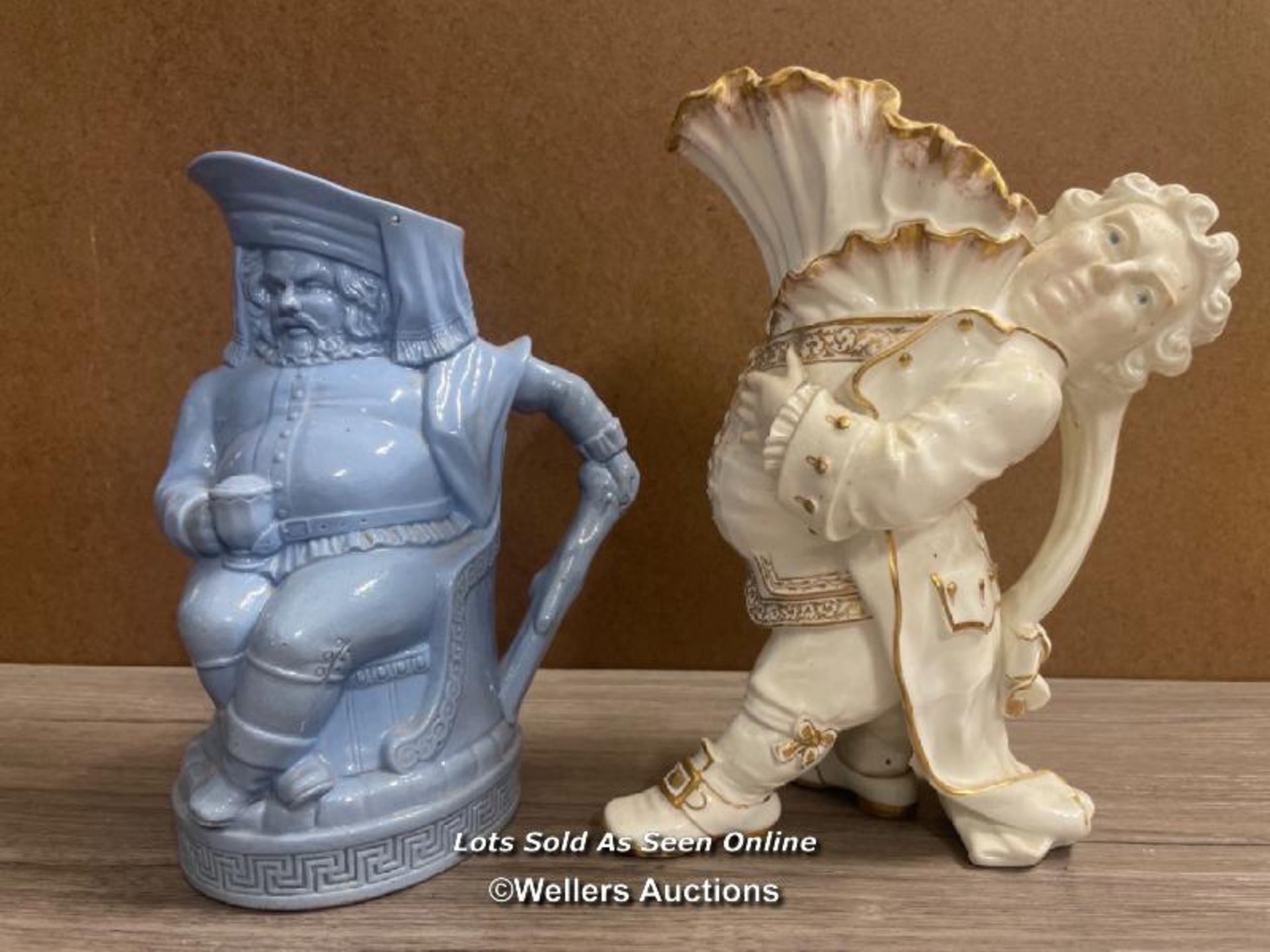 VICTORIAN GILT HEIGHTENED CHARACTER JUG MODELLED AS A PORTLY MAN WITH FRILLED SHIRT; BLUE GLAZE