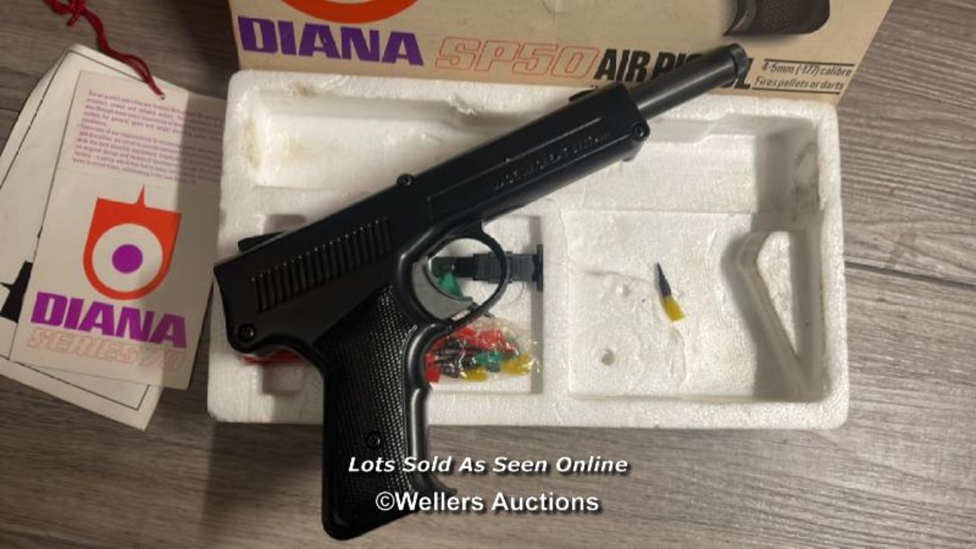 BOXED DIANA SP50 4.5MM AIR PISTOL WITH DARTS AND PELLETS. - Image 2 of 2