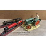 SHERRAT & SIMPSON MODEL OF BOY ON TRACTOR; TWO MODEL TRAINS