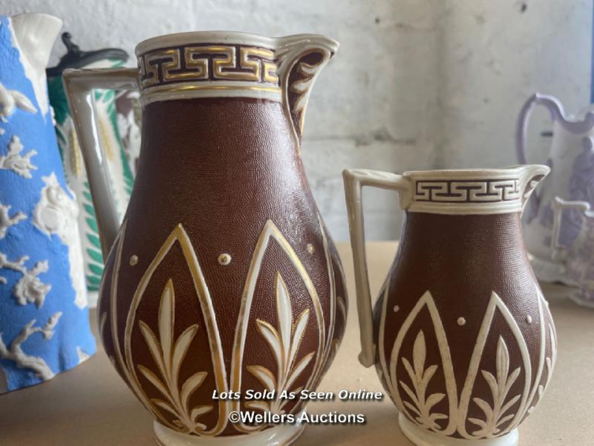 A COLLECTION OF VICTORIAN JUGS, SOME RELIEF MOULDED, SOME WITH LIDS, SOME GRADUATED PAIRS - Image 12 of 17