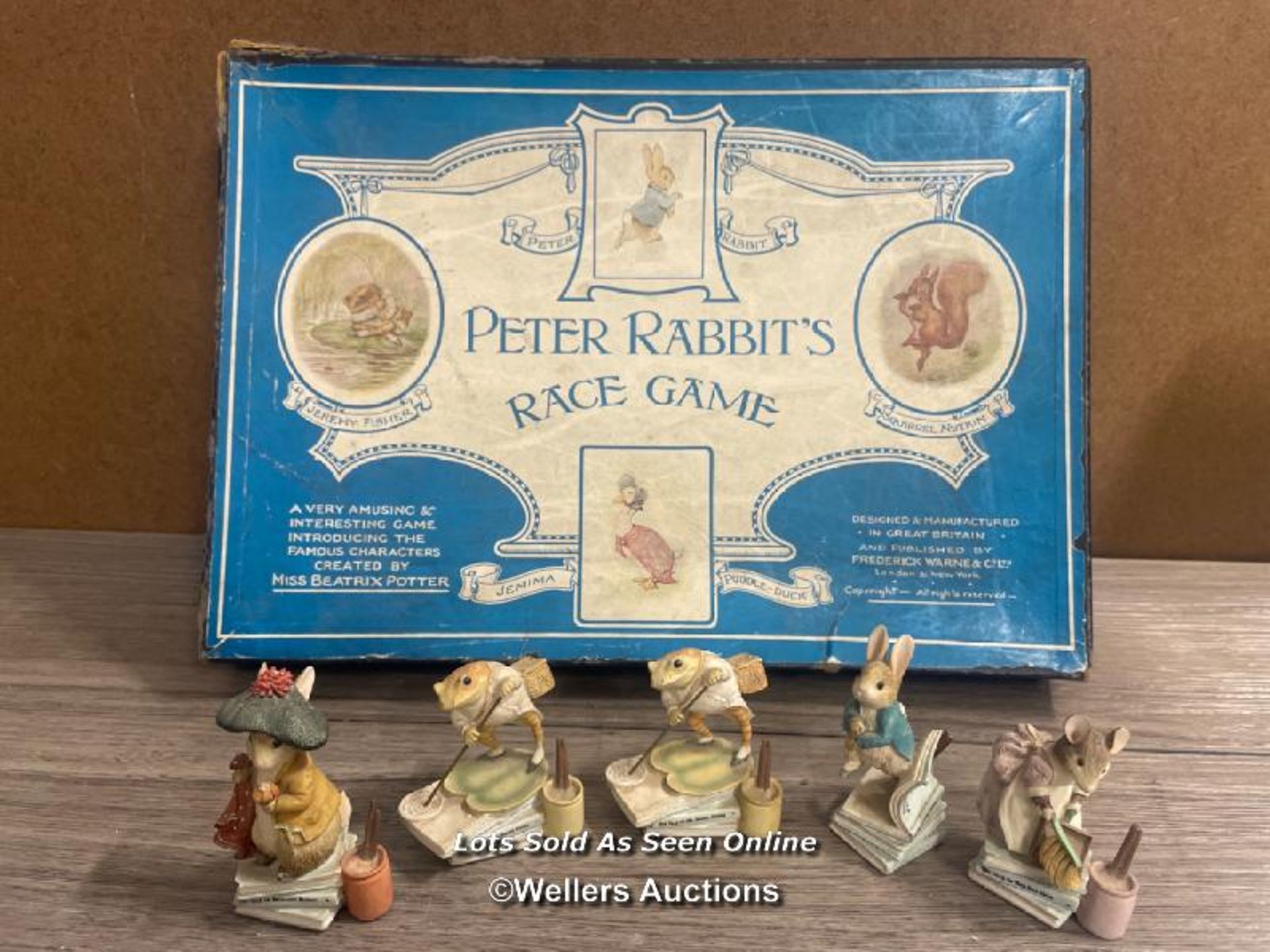 PETER RABBIT'S RACE GAME BY FREDERICK WARNE & CO, TOGETHER WITH SIX FIGURINES