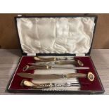 A CASED ANTLER HANDLED CARVING SET BY THOMAS WARD & SONS
