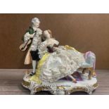 PORCELAIN FIGURINE OF A GENTLEMAN AND LADY, MARKED FOREIGN, 24CM HIGH, SOME DAMAGE TO THE LACE