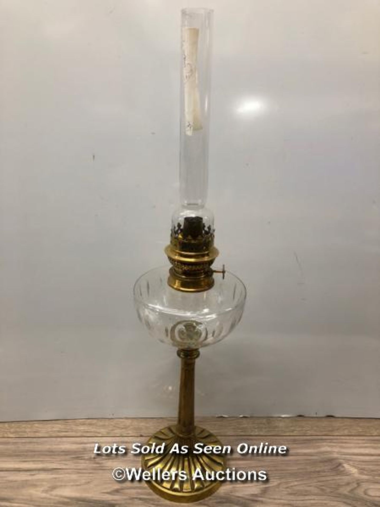 *TALL AND SLENDER OIL LAMP, GLASS RESERVOIR AND BRASS BASE