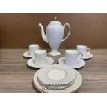 A PART WEDGWOOD BONE CHINA COFFEE SET OF FOUR CUPS, SIX SAUCERS, TWO SIDE PLATES AND COFFEE POT (