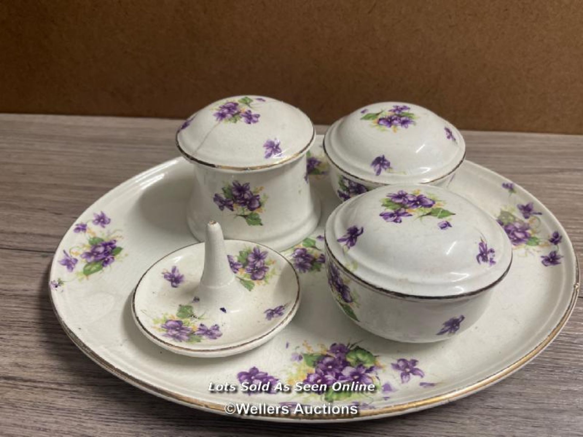 EARLY 2OTH CENTURY CERAMIC DRESSING TABLE SET DECORATED WITH VIOLETS