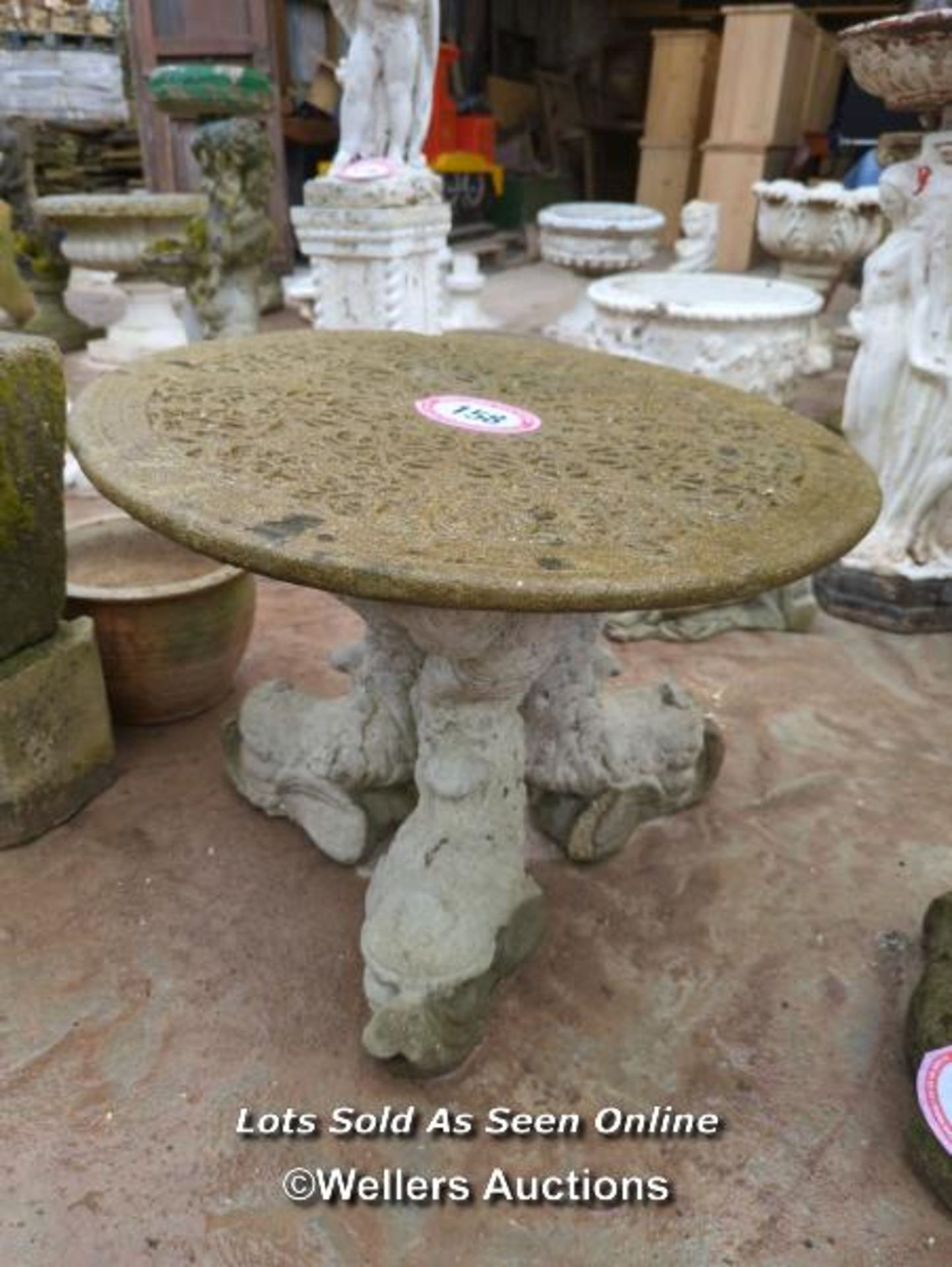 *CONCRETE TABLE ON A TRIO OF FISH PEDESTAL, 20 HIGH X 25 DIAMETER / ALL LOTS ARE LOCATED AT