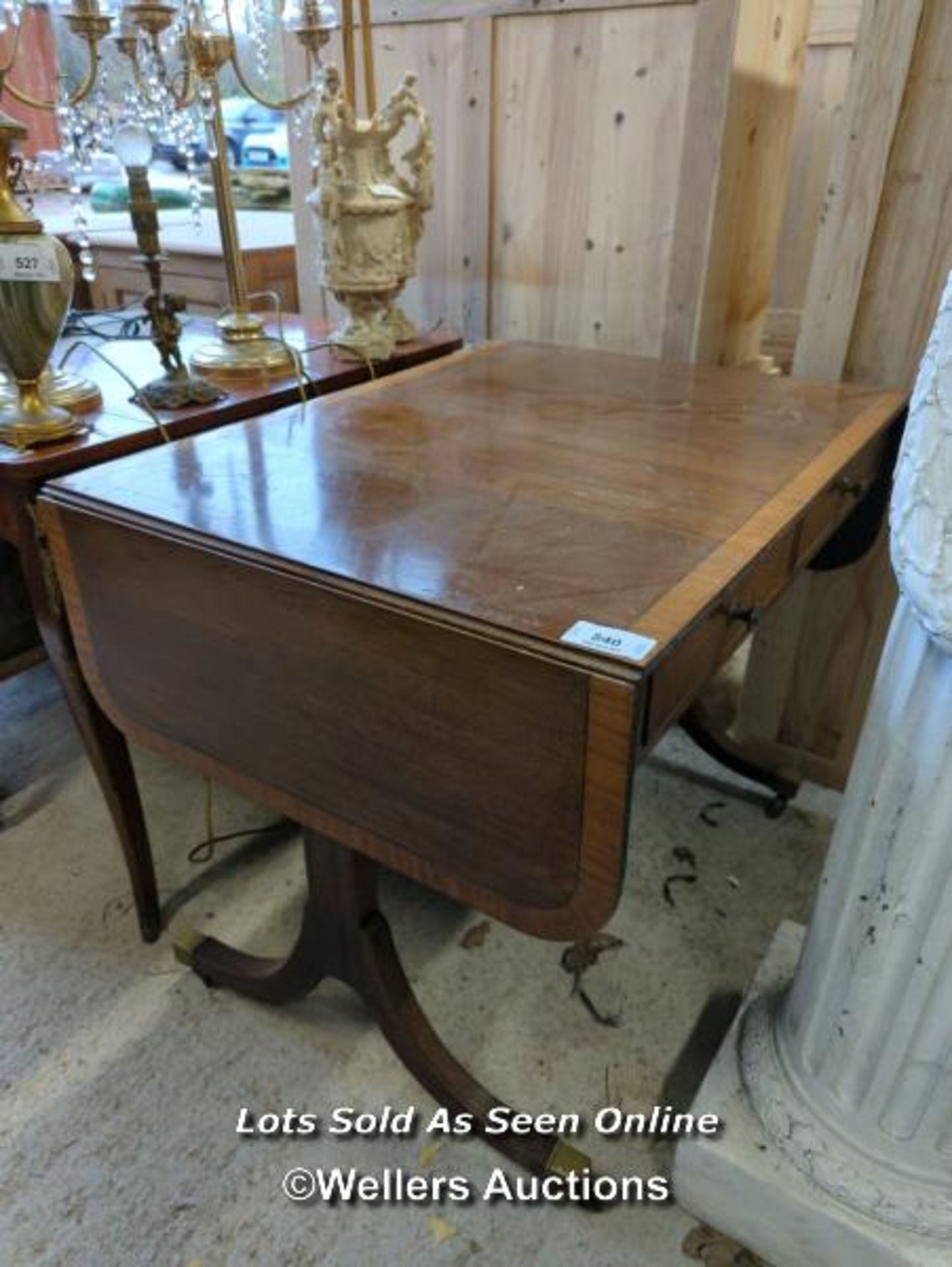 *MAHOGANY DROP LEAF TABLE WITH FOUR DRAWERS AND CASTORS ON FEET, 29.5 HIGH X 58 LONG WITH OPEN LEAFS