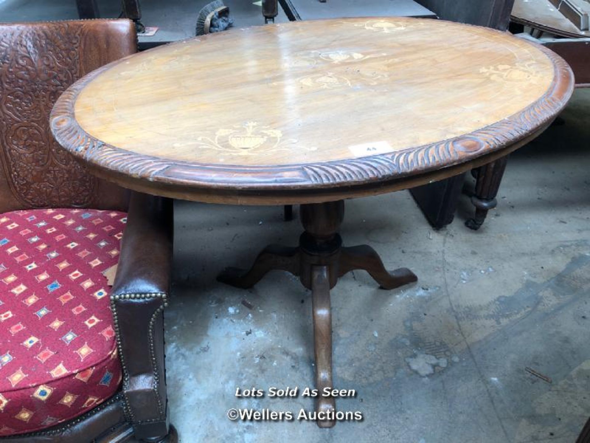 OVAL INLAID FOLDING TABLE ON TRIPOD BASE, 45.5 X 33 X 30 INCHES / LOCATED AT VICTORIA ANTIQUES,
