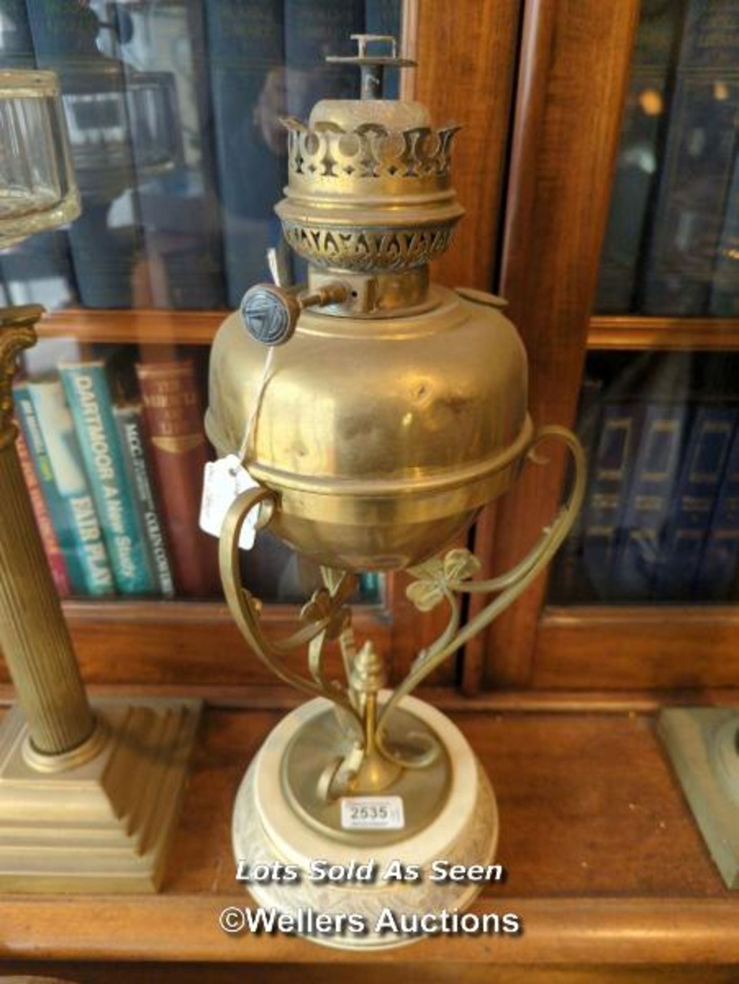 *VICTORIAN BRASS OIL LAMP WITH SHAMROCK MOTIF AND STONEWARE BASE / LOCATED AT VICTORIA ANTIQUES,