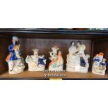 *FIVE STAFFORDSHIRE FLATBACK FIGURES OR SPILL VASES INCLUDING BAGPIPER / LOCATED AT VICTORIA