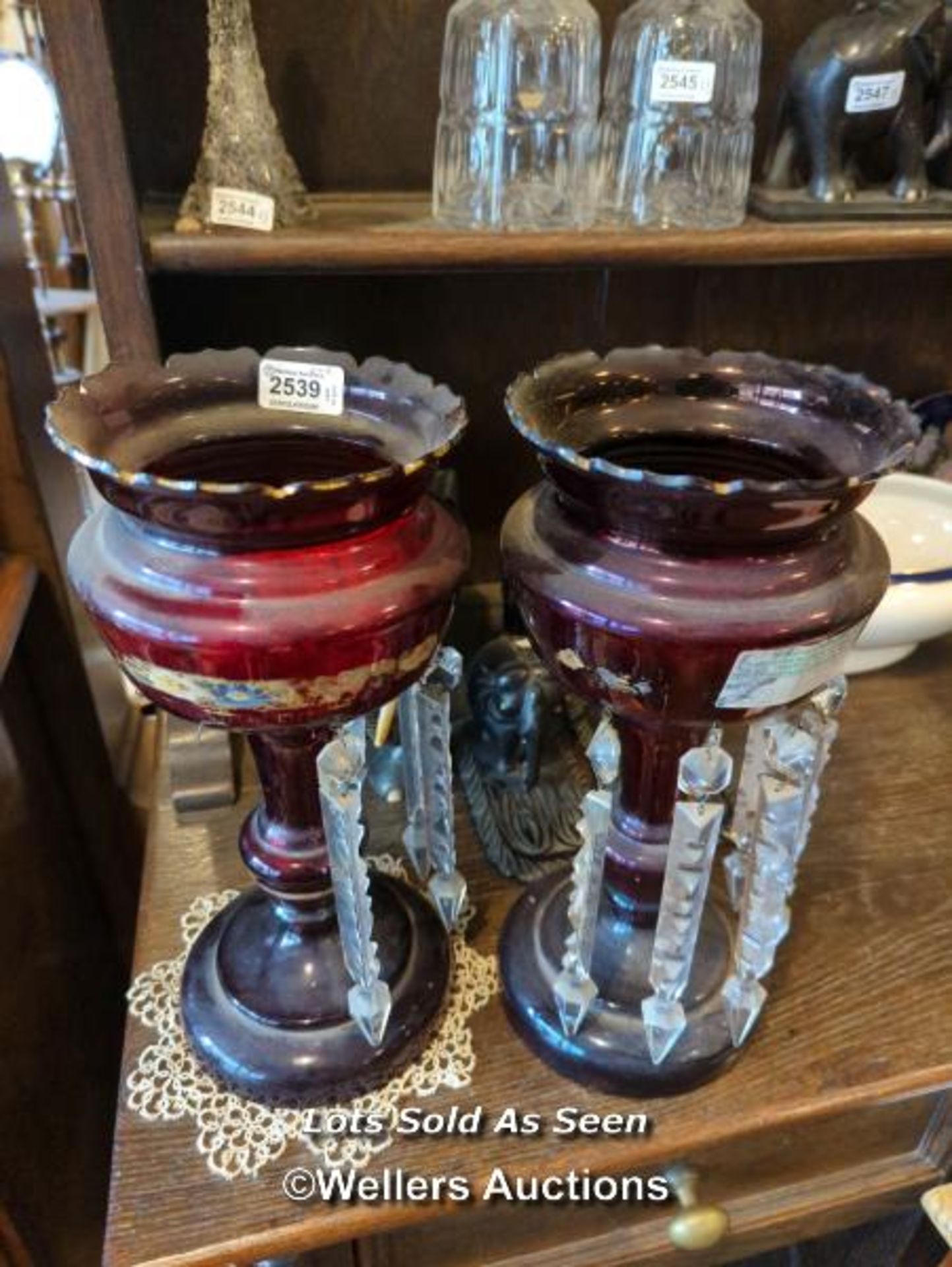 *PAIR OF VICTORIAN RUBY GLASS LUSTRES, 35CM, SOME DROPS LACKING / LOCATED AT VICTORIA ANTIQUES,