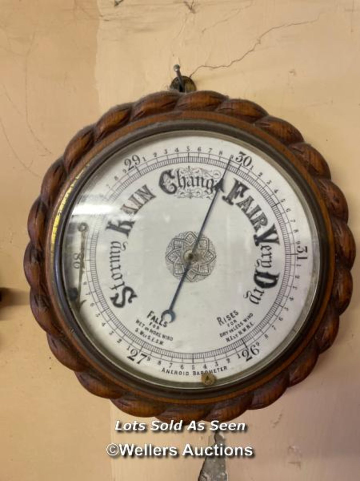 *CIRCULAR ANEROID BAROMETER IN ROPETWIST FRAME / LOCATED AT VICTORIA ANTIQUES, WADEBRIDGE, PL27 7DD