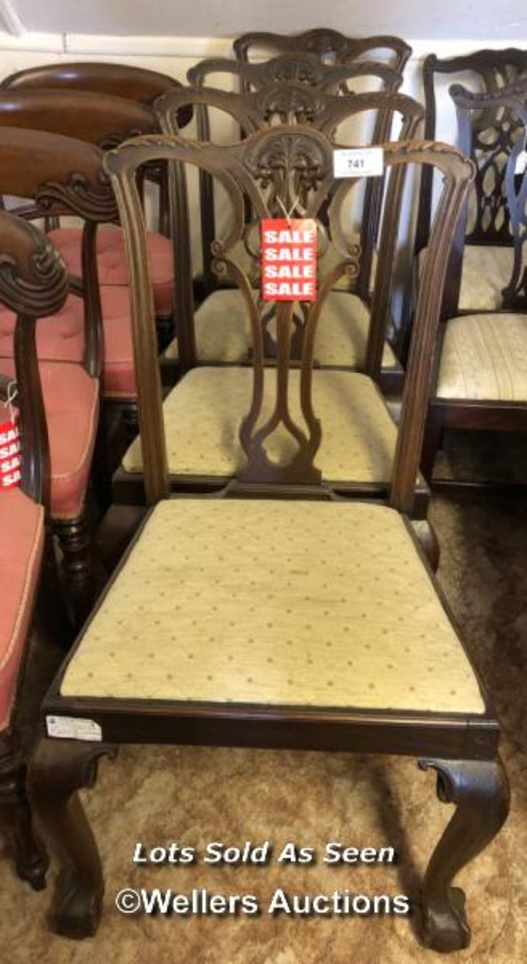 *SET OF FOUR CHAIRS WITH BALL AND CLAW FEET AND UPHOLSTERED SEATS / LOCATED AT VICTORIA ANTIQUES,