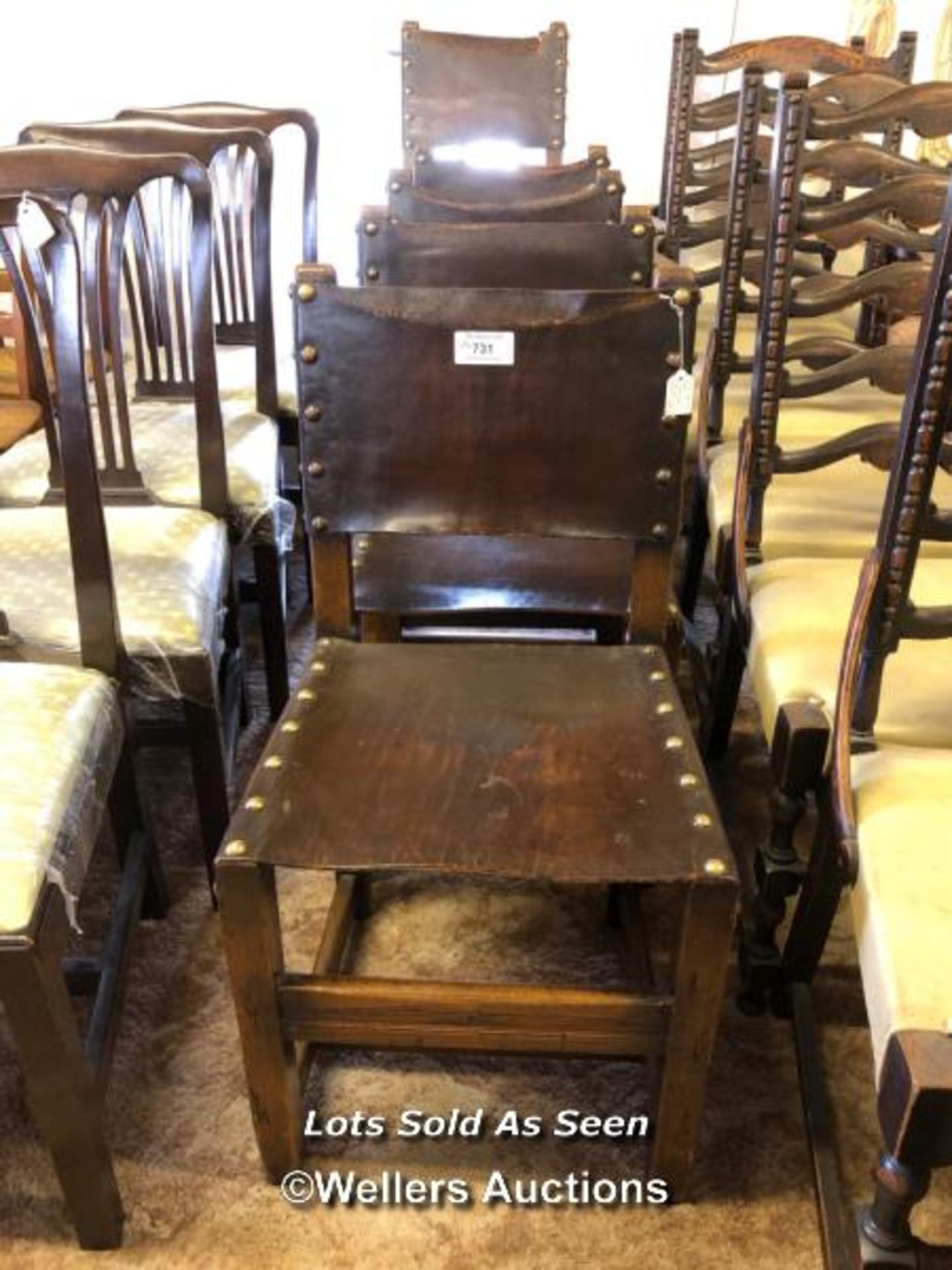 *SET OF FIVE OAK LEATHER SEATED AND BACK CHAIRS / LOCATED AT VICTORIA ANTIQUES, WADEBRIDGE, PL27
