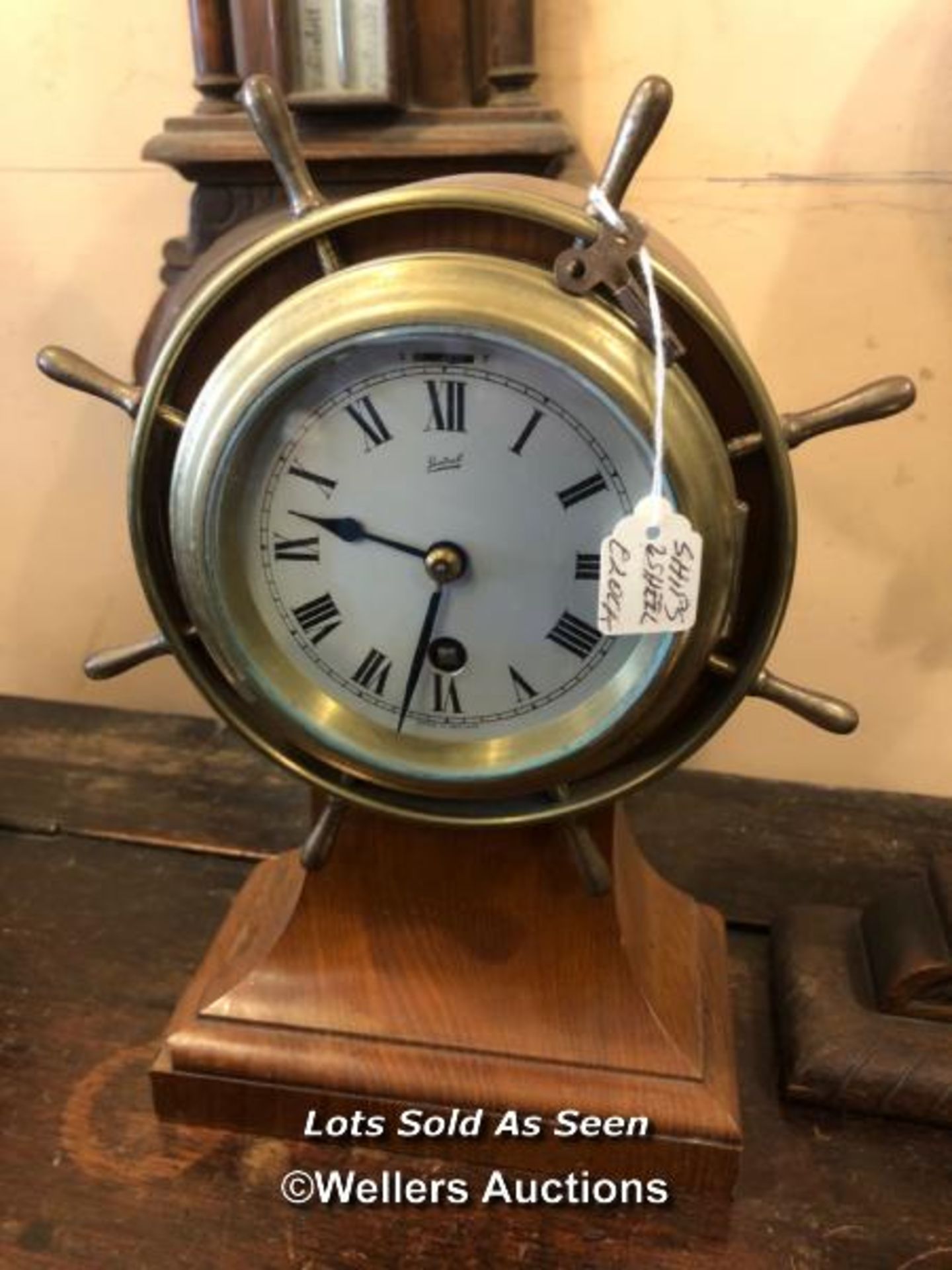 *BALLOON SHAPED MANTEL CLOCK MODELLED AS A SHIP'S WHEEL / LOCATED AT VICTORIA ANTIQUES,