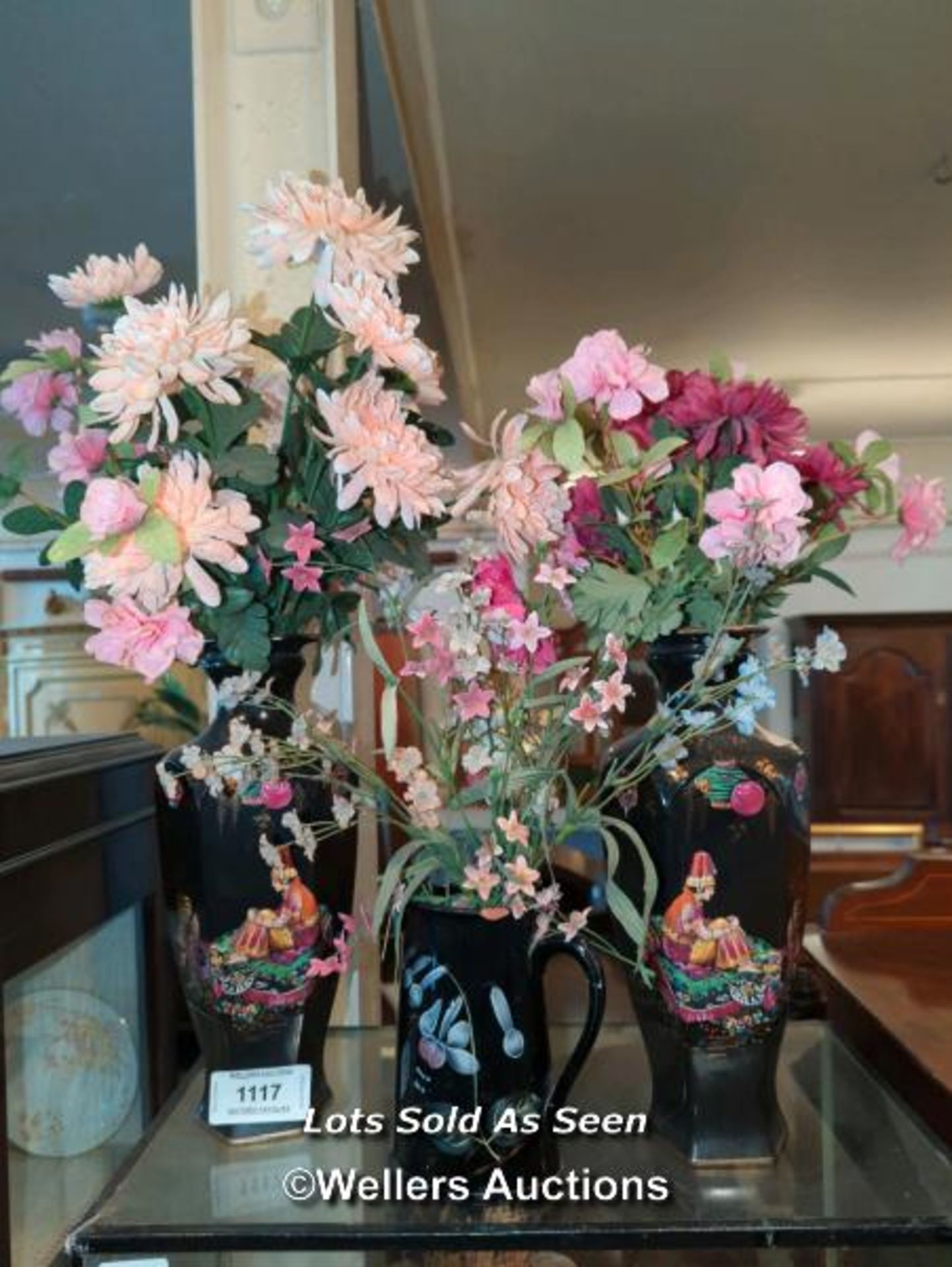 *PAIR OF BLACK INDIAN STYLE PAINTED VASES, TOGETHER WITH A SMALL BLACK JUG / LOCATED AT VICTORIA