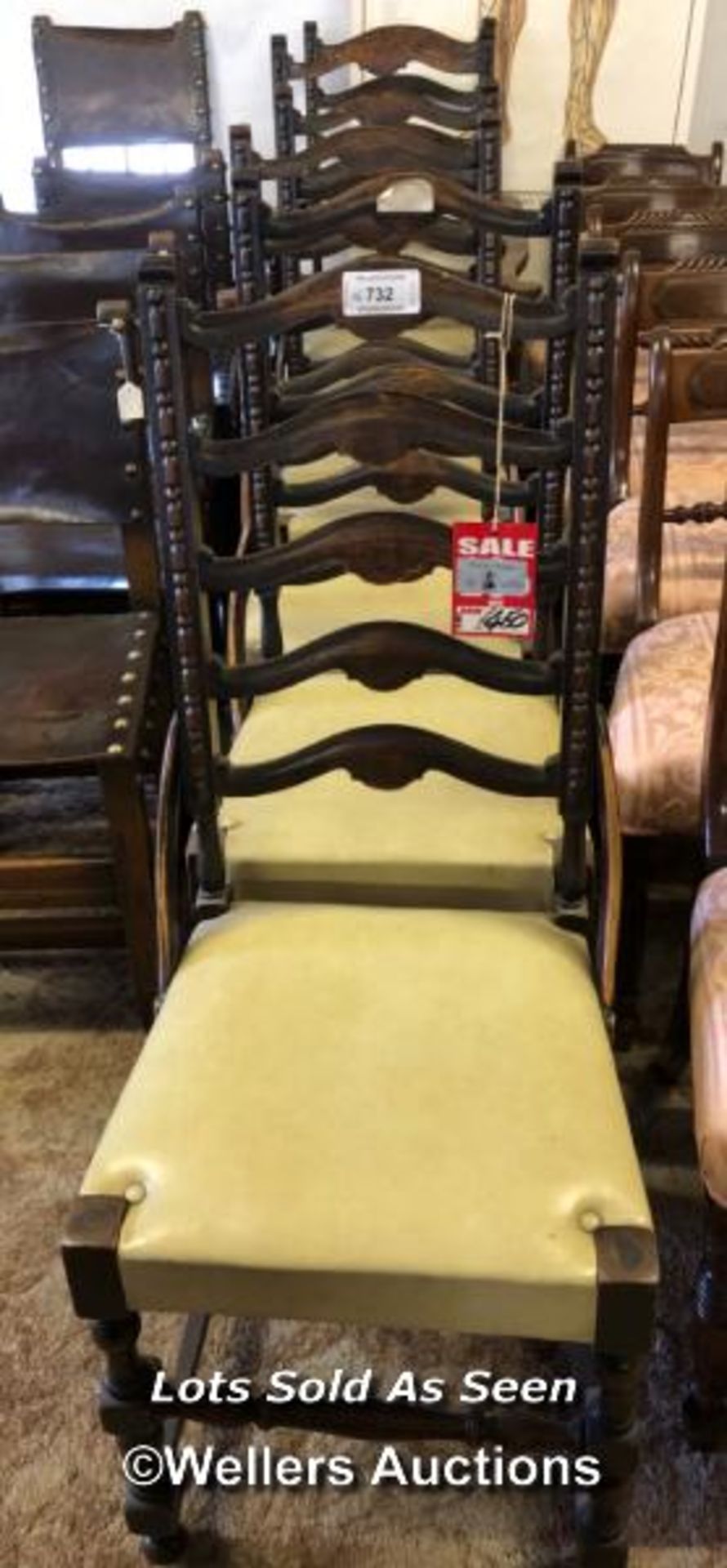 *SET OF SIX OAK LADDER BACK CHAIRS INCLUDING TWO CARVERS WITH UPHOLSTERED SEATS / LOCATED AT