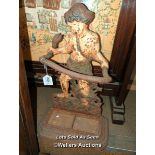 *CAST IRON FIGURAL STICK STAND OF A BOY GRAPPLING A SNAKE, 48CM / LOCATED AT VICTORIA ANTIQUES,