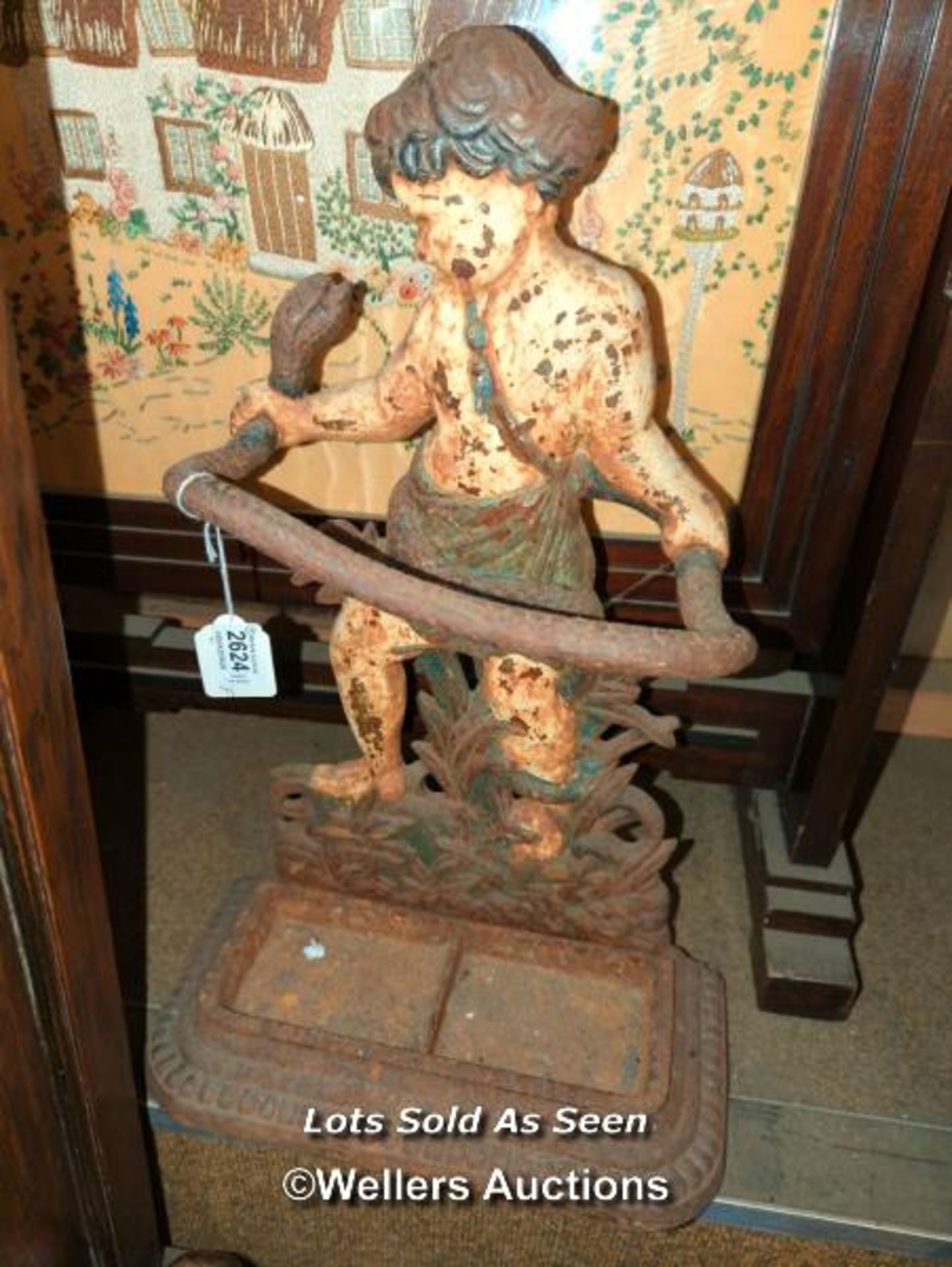 *CAST IRON FIGURAL STICK STAND OF A BOY GRAPPLING A SNAKE, 48CM / LOCATED AT VICTORIA ANTIQUES,