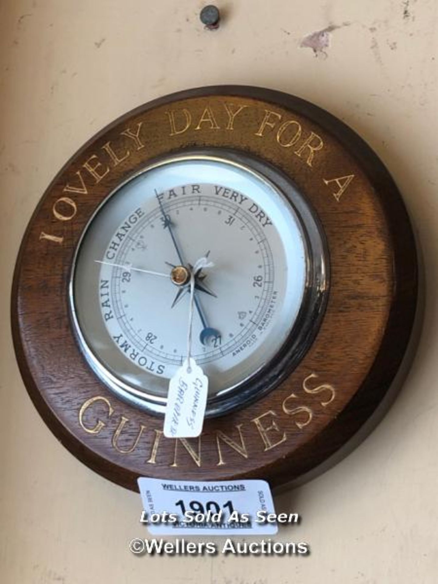 *ANEROID BAROMETER, THE FRAME PAINTED 'LOVELY DAY FOR A GUINESS' / LOCATED AT VICTORIA ANTIQUES,