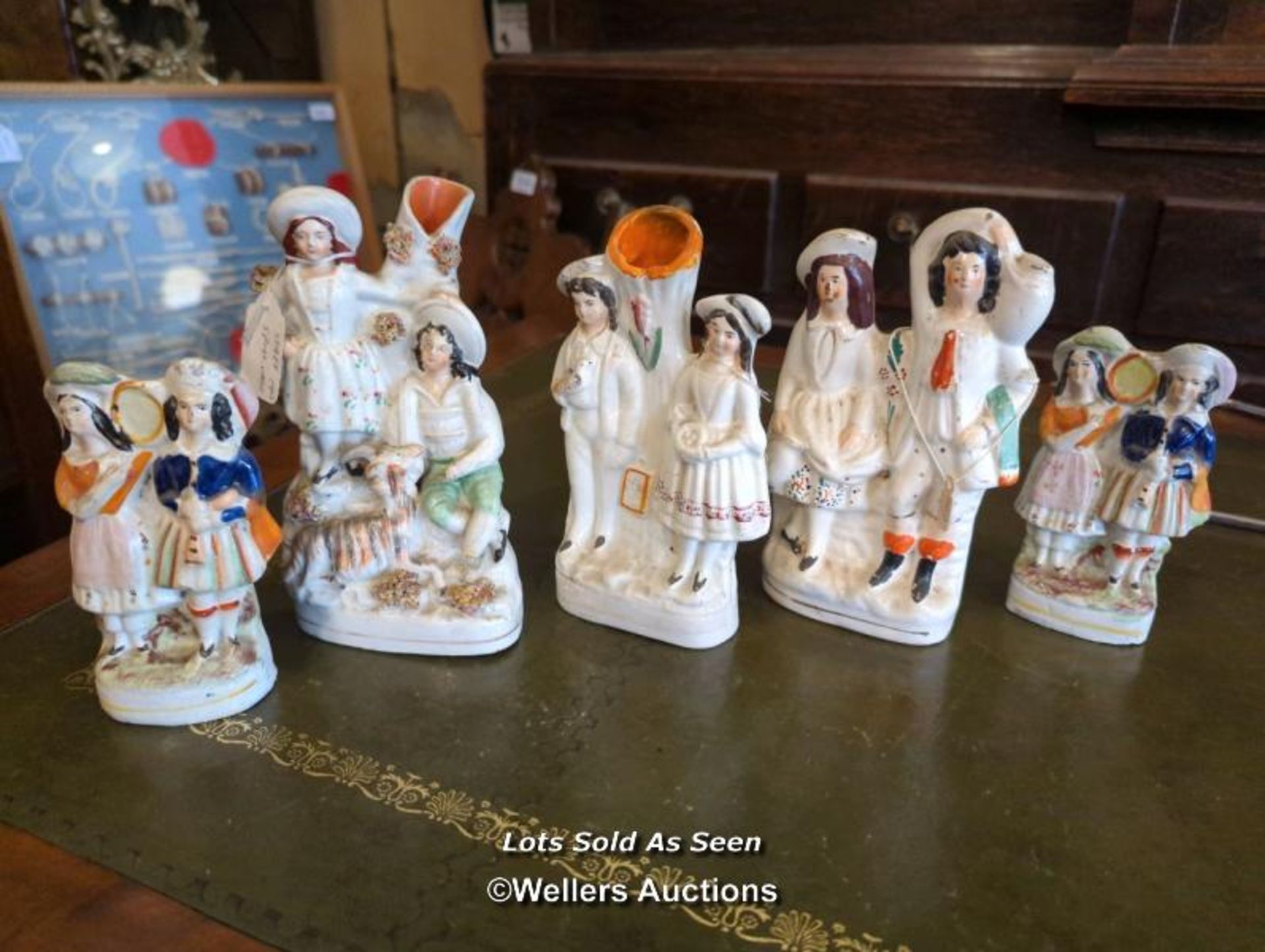 *FIVE STAFFORDSHIRE FLATBACK FIGURES INCLUDING A PAIR / LOCATED AT VICTORIA ANTIQUES, WADEBRIDGE,