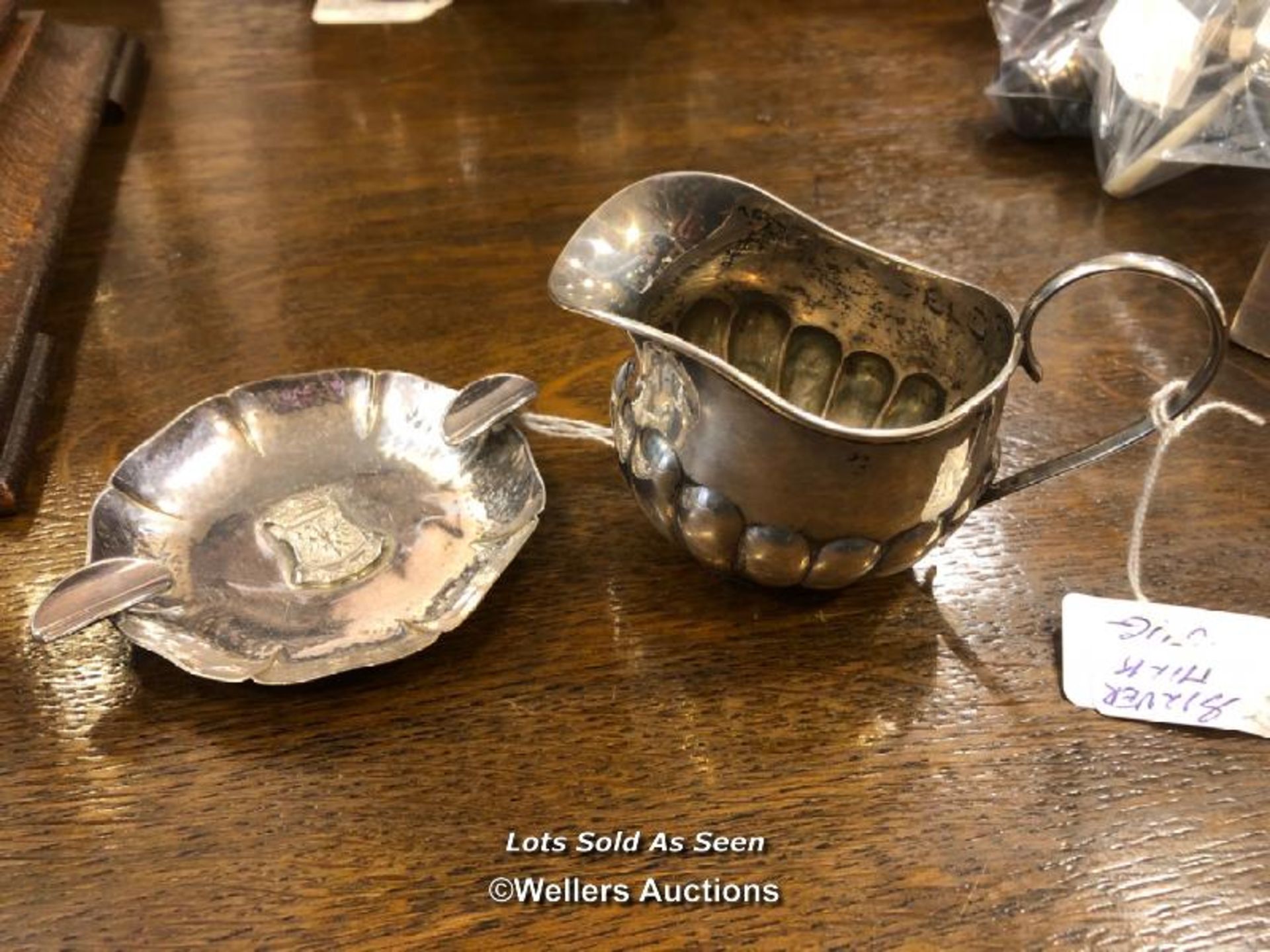 *WHITE METAL ASHTRAY STAMPED 90; SILVER CREAM JUG SHEFFIELD 1893 / LOCATED AT VICTORIA ANTIQUES,