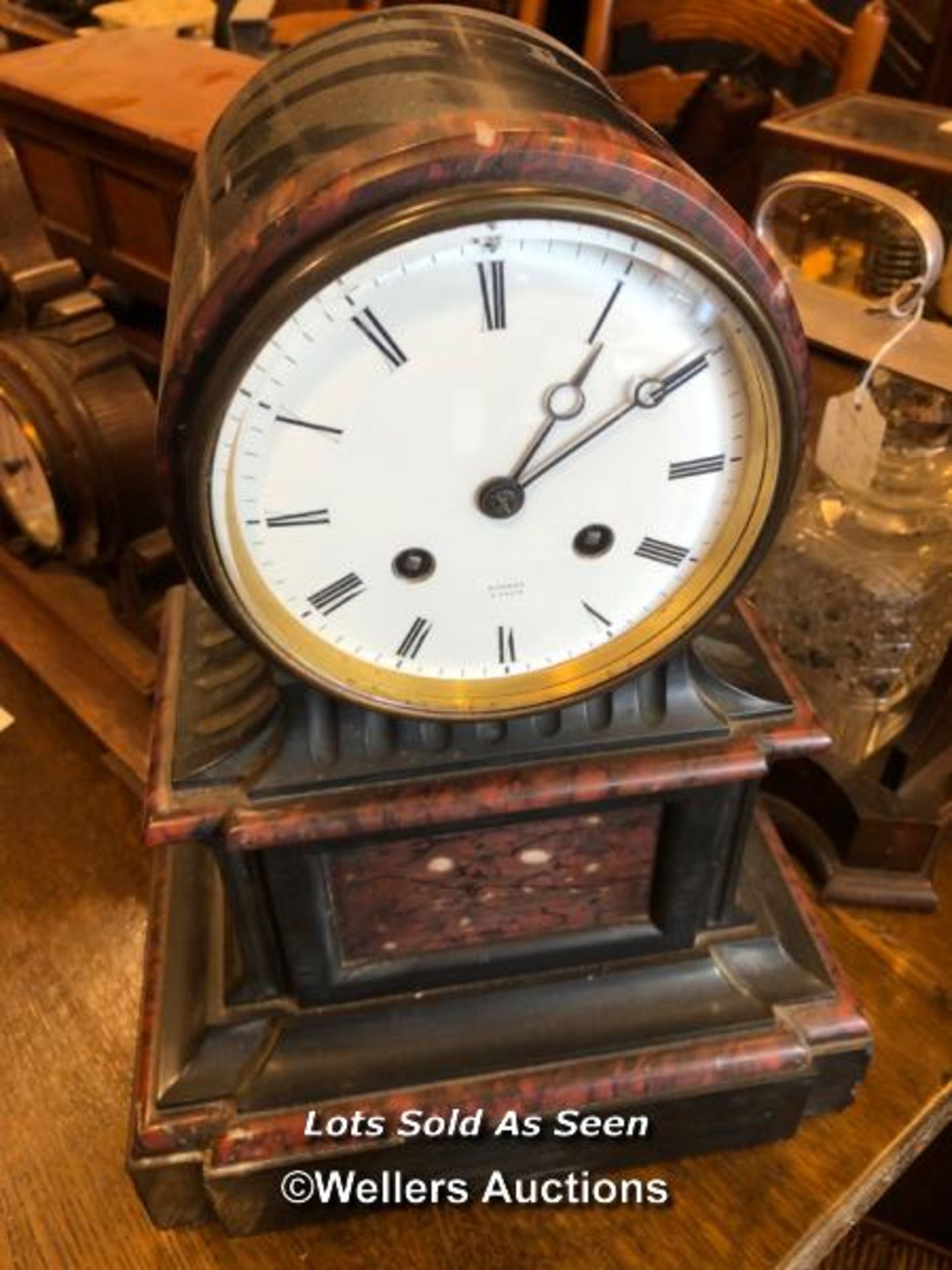 *VICTORIAN BLACK SLATE AND RED MARBLE MANTEL CLOCK WITH TWO TRAIN MOVEMENT / LOCATED AT VICTORIA