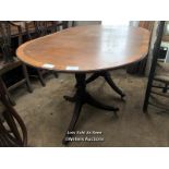 OAK OVAL EXTENDING DINING TABLE ON TWO TRIPOD BASES WITH CLAW FEET, 59.5 X 38.5 X 29.5 INCHES /
