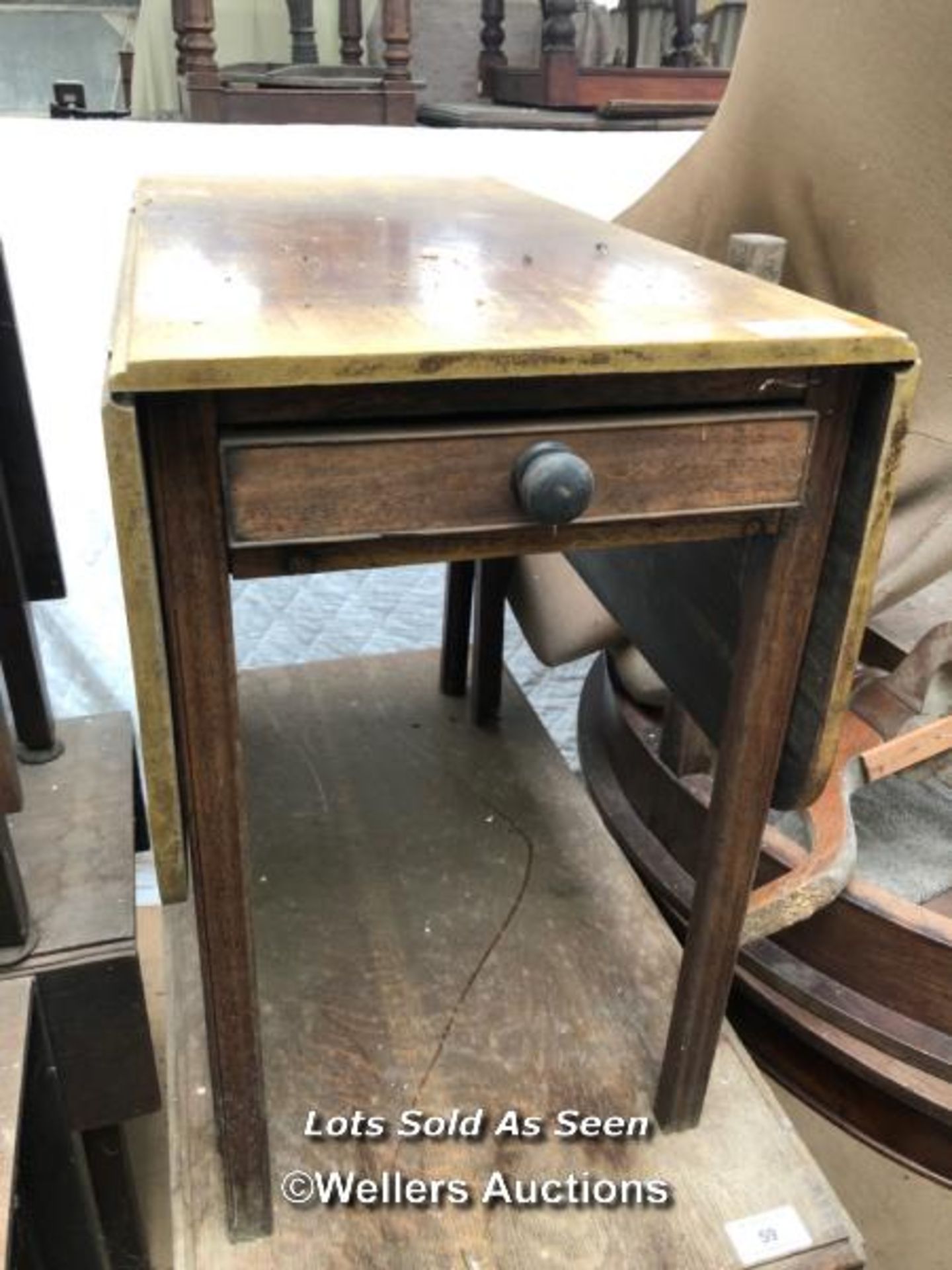 DROP LEAF TABLE WITH ONE DRAWER, 34 X 44 X 28.5 INCHES, FULLY EXTENDED / LOCATED AT VICTORIA