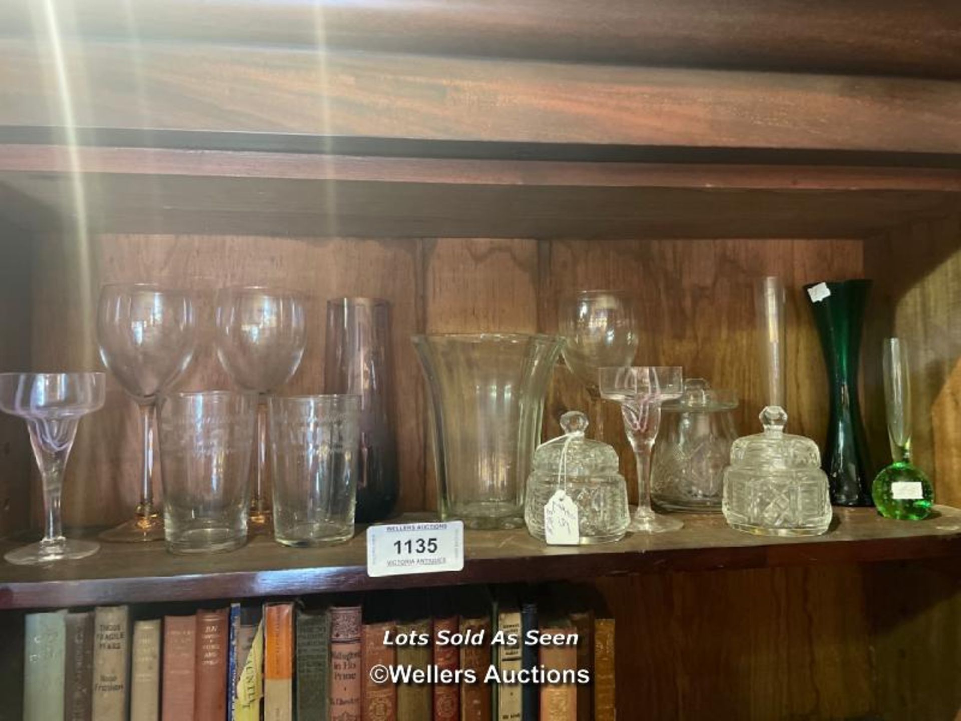 *SHELF OF ASSORTED GLASSWARE, INCLUDING VASES AND LIDDED POTS, ETC. / LOCATED AT VICTORIA