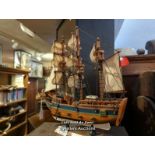 *SMALL WOODEN MODEL OF H.M.S. BOUNTY, 33CM HIGH / LOCATED AT VICTORIA ANTIQUES, WADEBRIDGE, PL27