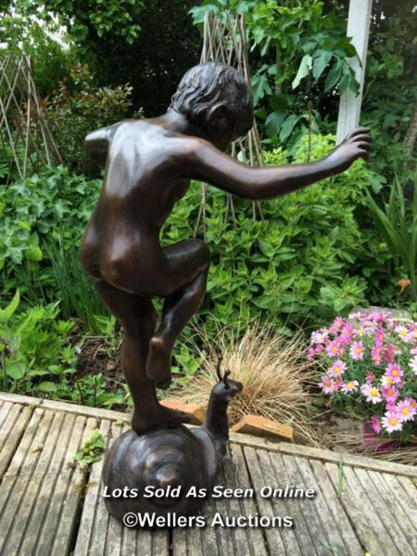 *GARDEN WATER FEATURE OF A BRONZE BOY ON SNAIL, SNAIL IS PIPED FOR WATER SO CAN BE USED AS A WATER - Image 4 of 5