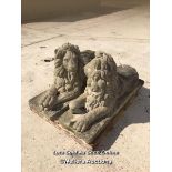*PAIR OF AGED RECONSTITUTED STONE LAYING LIONS, 74CM (H) X 130CM (L) X 45CM (W), BACK RIGHT CORNER