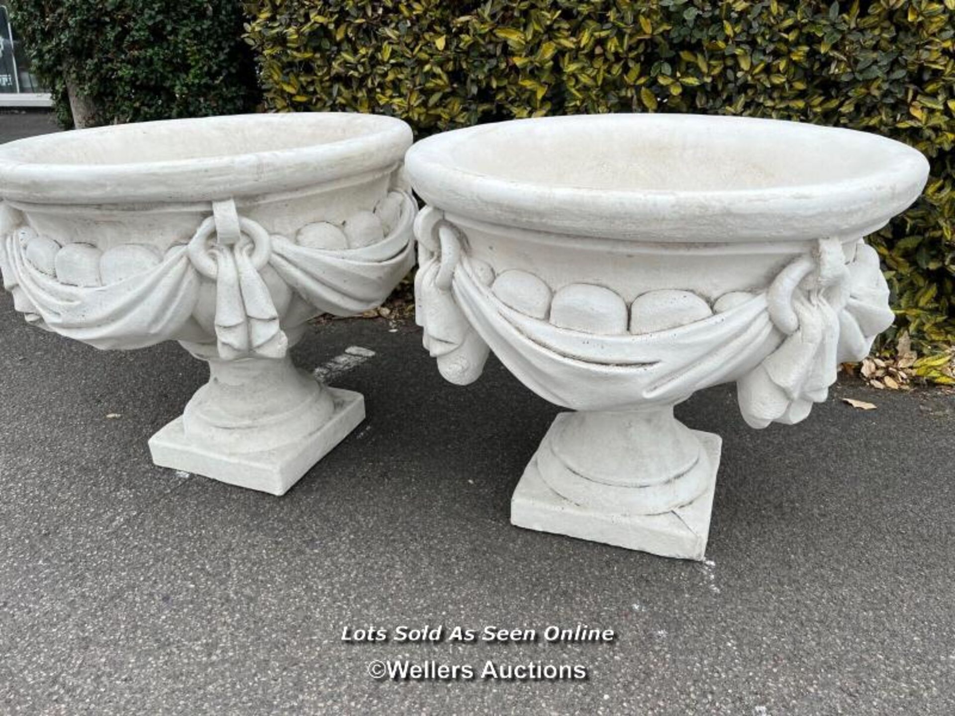 *PAIR OF LARGE WHITE STONE AND CRUSHED MARBLE URNS, LOOP AND SWAG DESIGN AROUND SIDES WITH ANTIQUE - Image 2 of 4