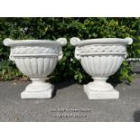 *PAIR OF SMALL URNS IN WHITE CAST STONE, TWISTED ROPE DESIGN WITH DRAPERY HANDLES, 47CM (H) X