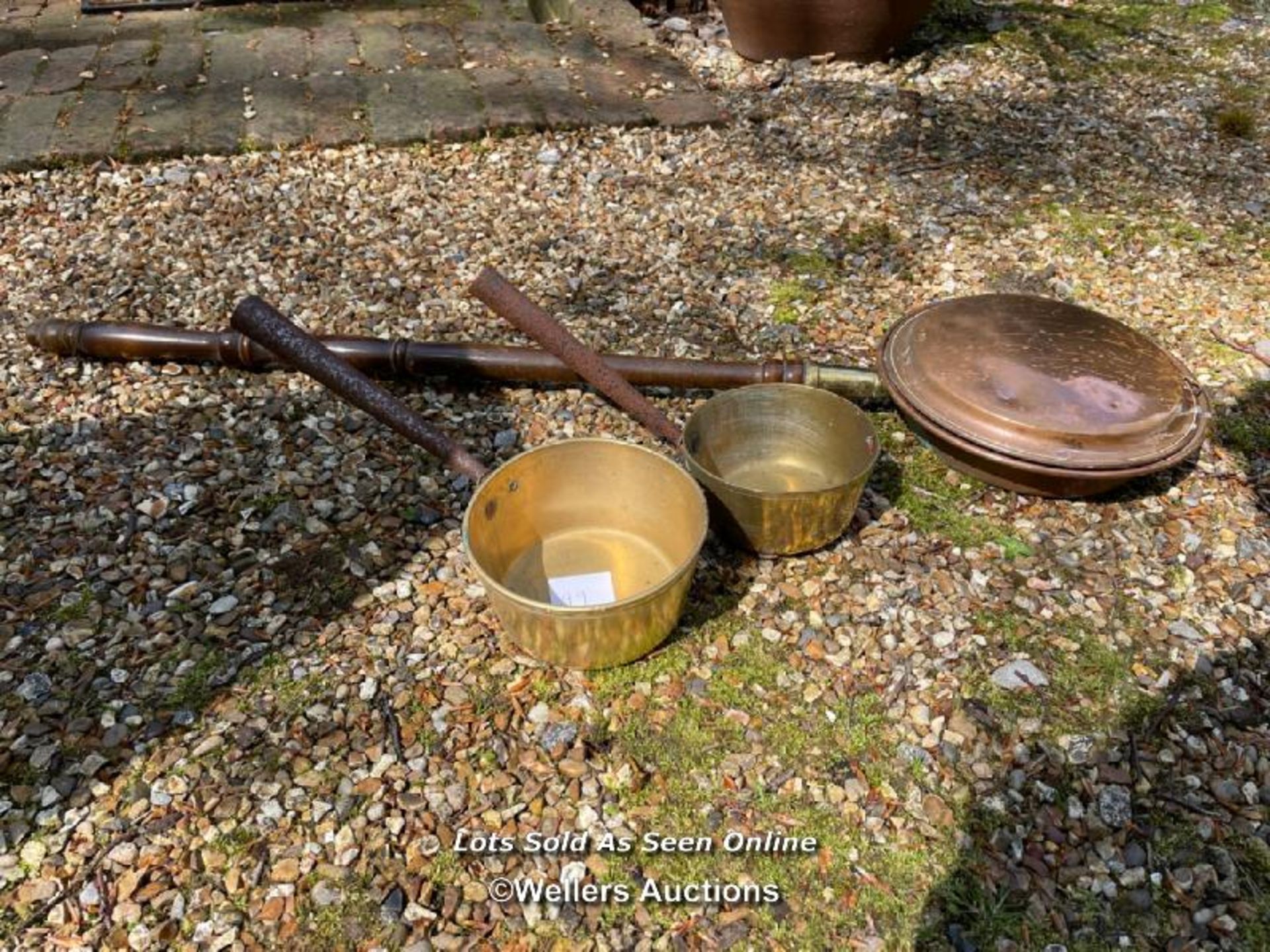 TWO BRASS PANS AND A COPPER BED PAN / COLLECTION LOCATION: WOKING (GU24), FULL ADDRESS AND VENDOR