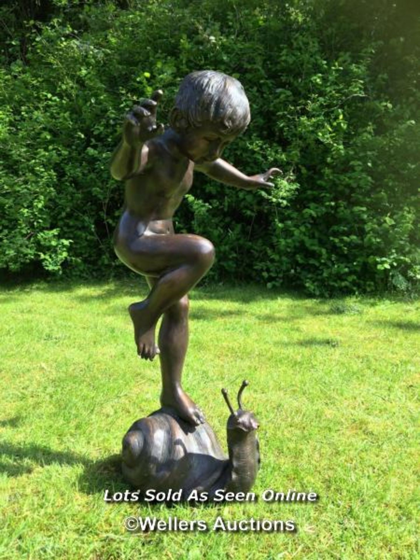 *GARDEN WATER FEATURE OF A BRONZE BOY ON SNAIL, SNAIL IS PIPED FOR WATER SO CAN BE USED AS A WATER - Image 3 of 5